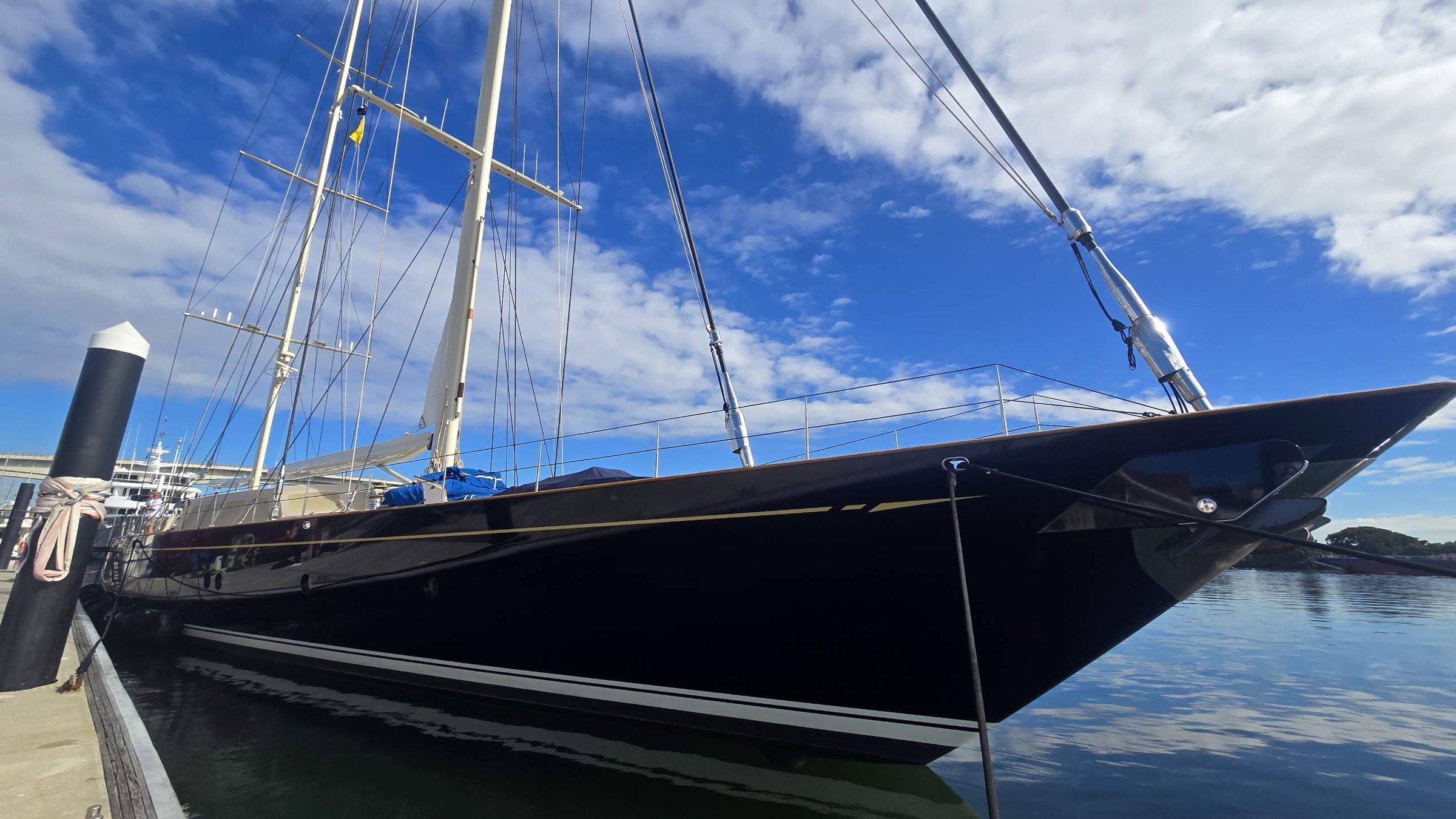 Sailing superyacht berthed on the Brisbane River