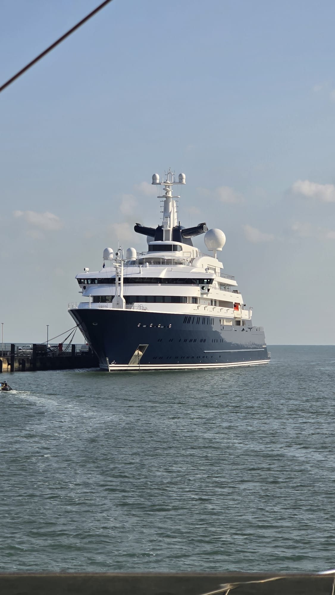 Expedition superyacht moored at a Cairns wharf