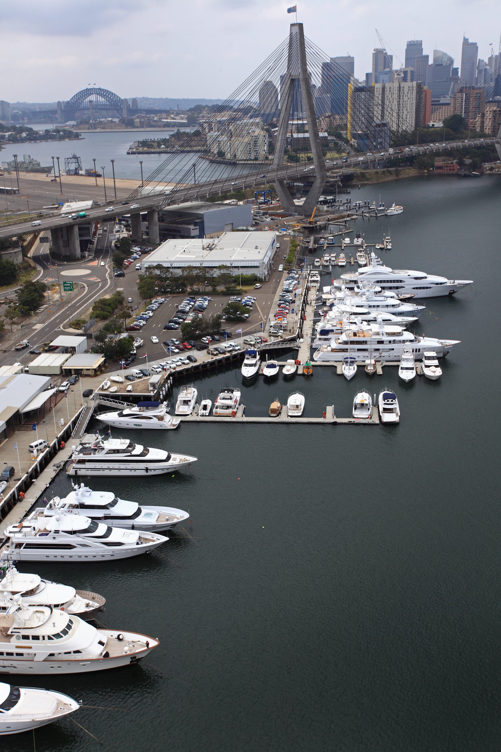 Aerial view of superyachts berthed in a Sydney marina